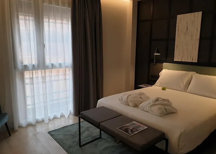 Sercotel Ayala Отель